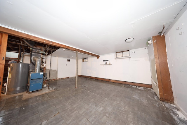 166 Wynola Ave, New Britain, CT 06051 - unfinished basement featuring water heater and tile patterned floors