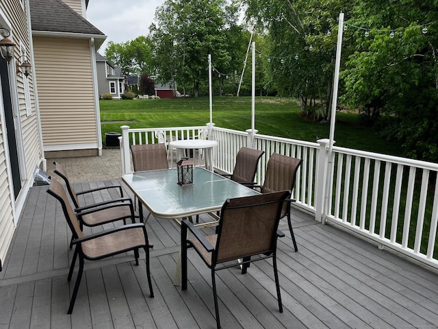 37 Ellsworth Ln, Ellington, CT 06029 - deck featuring outdoor dining area and a lawn