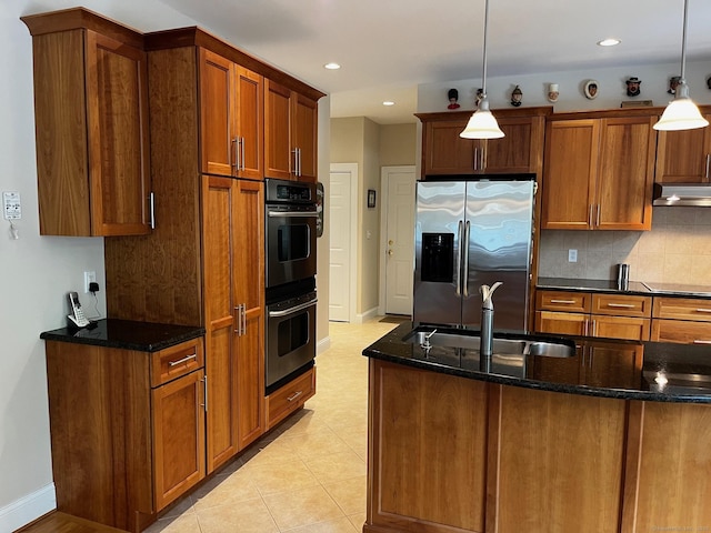 37 Ellsworth Ln, Ellington, CT 06029 - kitchen with stainless steel fridge, a sink, under cabinet range hood, double wall oven, and backsplash