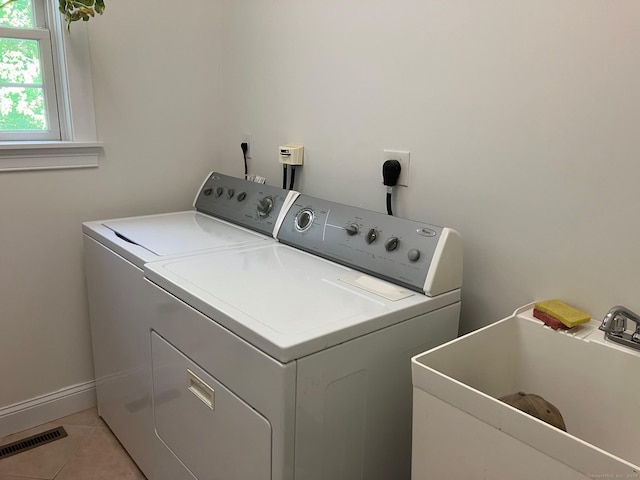 37 Ellsworth Ln, Ellington, CT 06029 - laundry room with independent washer and dryer and light tile patterned floors