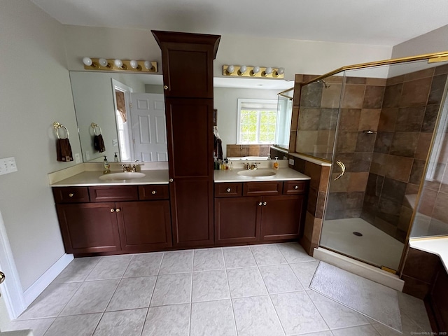 37 Ellsworth Ln, Ellington, CT 06029 - bathroom with double vanity, a shower stall, and tile patterned floors