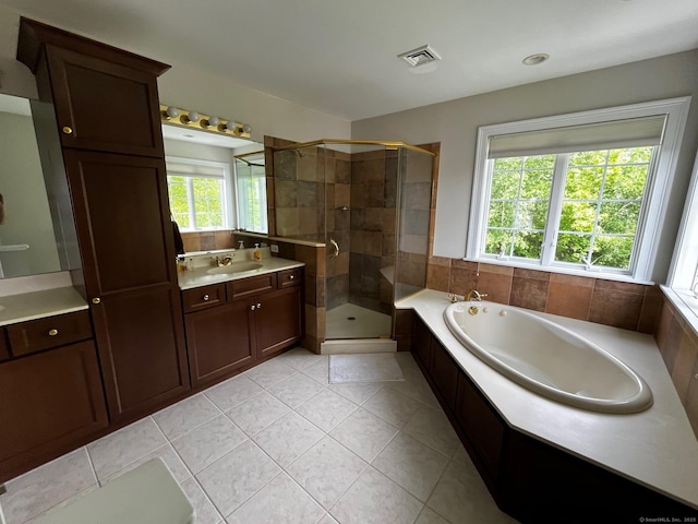 37 Ellsworth Ln, Ellington, CT 06029 - full bathroom featuring healthy amount of natural light, a shower stall, and a garden tub