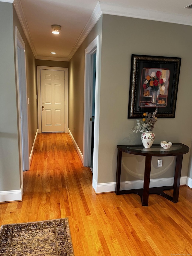 37 Ellsworth Ln, Ellington, CT 06029 - corridor featuring crown molding, light wood finished floors, and baseboards