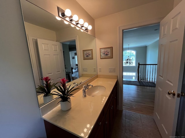 37 Ellsworth Ln, Ellington, CT 06029 - bathroom with a chandelier, vanity, and tile patterned floors