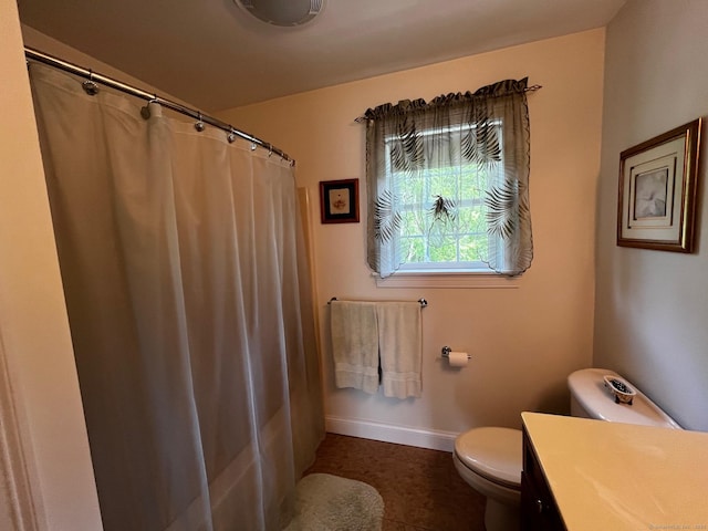 37 Ellsworth Ln, Ellington, CT 06029 - full bathroom featuring toilet, vanity, baseboards, and curtained shower