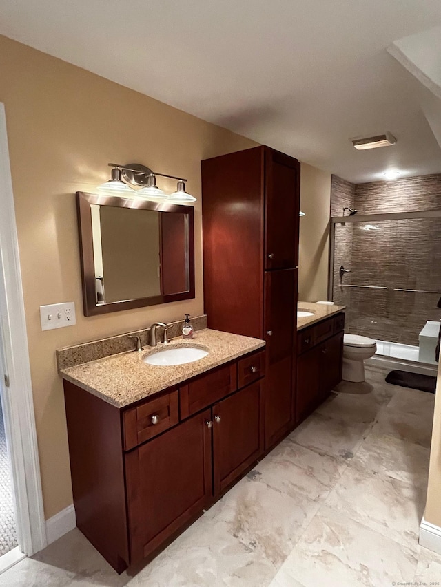 37 Ellsworth Ln, Ellington, CT 06029 - bathroom featuring a stall shower, vanity, and toilet