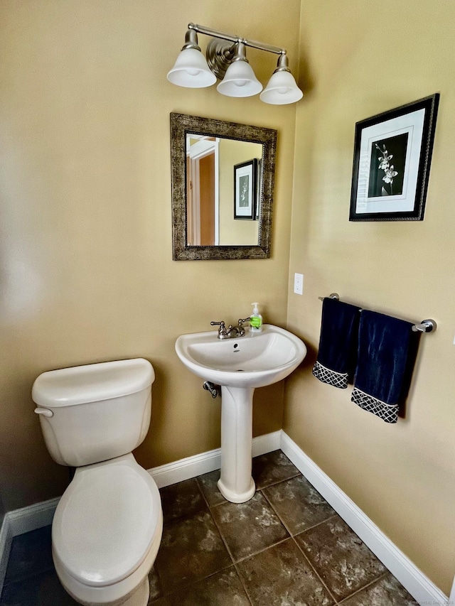 37 Ellsworth Ln, Ellington, CT 06029 - bathroom with baseboards and toilet