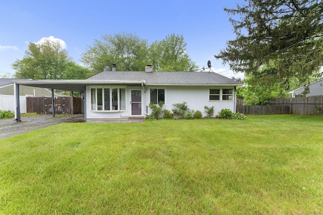 4 Meadow Rd, Enfield, CT 06082 - rear view of house featuring driveway, a carport, and a chimney