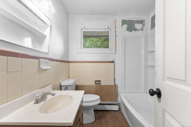 4 Meadow Rd, Enfield, CT 06082 - bathroom with baseboard heating, toilet, vanity, tile walls, and wood finished floors