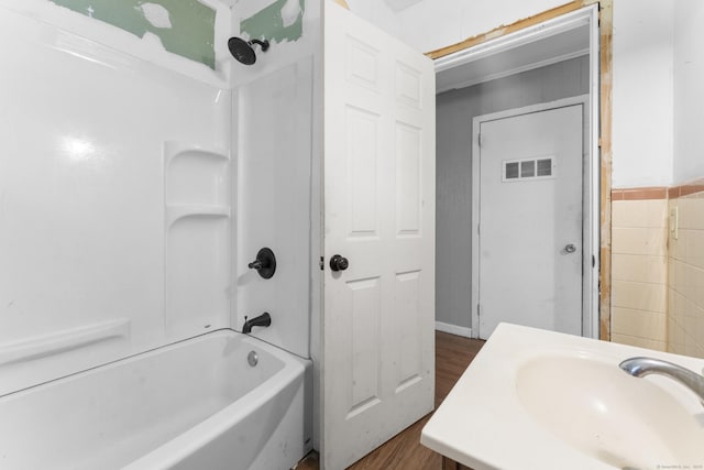 4 Meadow Rd, Enfield, CT 06082 - full bath featuring a sink, wood finished floors, and  shower combination