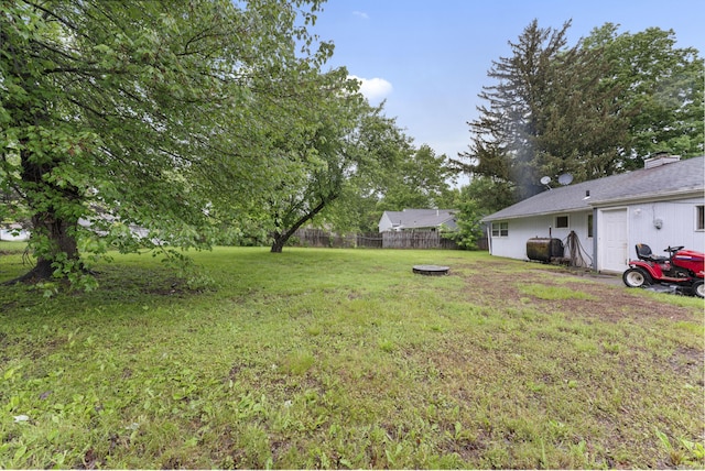 4 Meadow Rd, Enfield, CT 06082 - view of yard featuring a fire pit and heating fuel