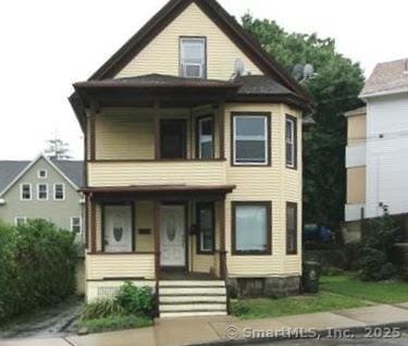 48 Moore Ave, New London, CT 06320 - view of front of home featuring a porch and a balcony
