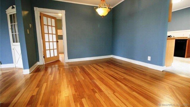 48 Moore Ave, New London, CT 06320 - empty room featuring ornamental molding, light wood-style flooring, and baseboards