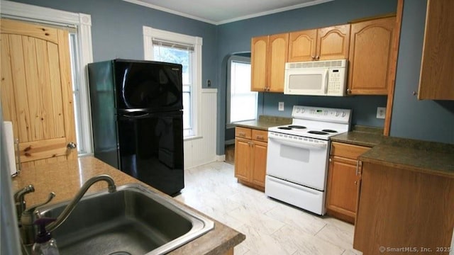 48 Moore Ave, New London, CT 06320 - kitchen featuring white appliances, a sink, ornamental molding, and dark countertops