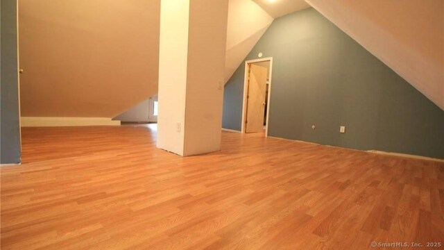 48 Moore Ave, New London, CT 06320 - additional living space with wood finished floors and vaulted ceiling