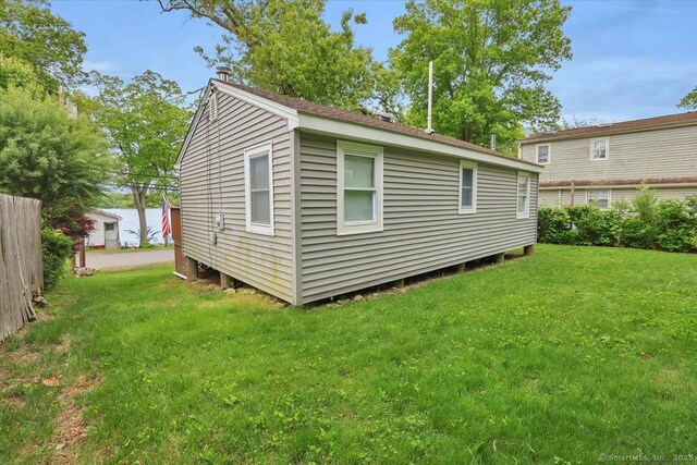 124 Deepwood Dr, Hebron, CT 06231 - view of side of property featuring a lawn