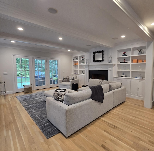20 Crawford Rd, Westport, CT 06880 - living room with light wood-style floors, beamed ceiling, a fireplace, ornamental molding, and recessed lighting