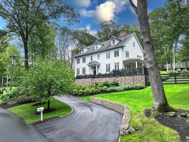 20 Crawford Rd, Westport, CT 06880 - view of front of house featuring a chimney