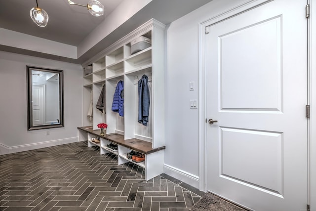 20 Crawford Rd, Westport, CT 06880 - mudroom featuring baseboards and brick patterned floors