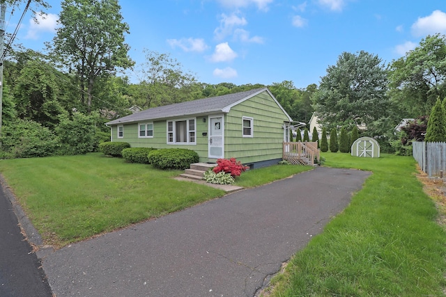 52 Fairview Ave, Bristol, CT 06010 - view of front of house featuring a front lawn