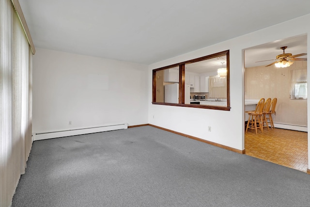 52 Fairview Ave, Bristol, CT 06010 - carpeted spare room with a baseboard radiator, baseboards, and a ceiling fan