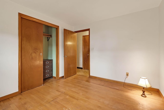 52 Fairview Ave, Bristol, CT 06010 - unfurnished bedroom featuring light wood finished floors, baseboards, and a closet