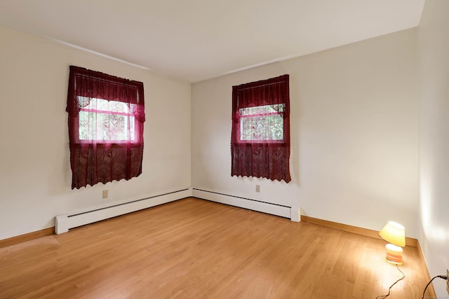 52 Fairview Ave, Bristol, CT 06010 - empty room featuring healthy amount of natural light, wood finished floors, and baseboards