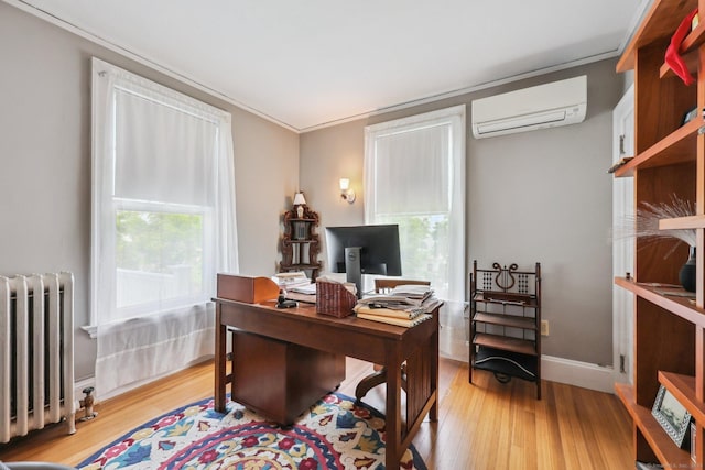 222 N Beacon St, Hartford, CT 06105 - office area featuring radiator, a wall mounted air conditioner, light wood-style flooring, ornamental molding, and baseboards