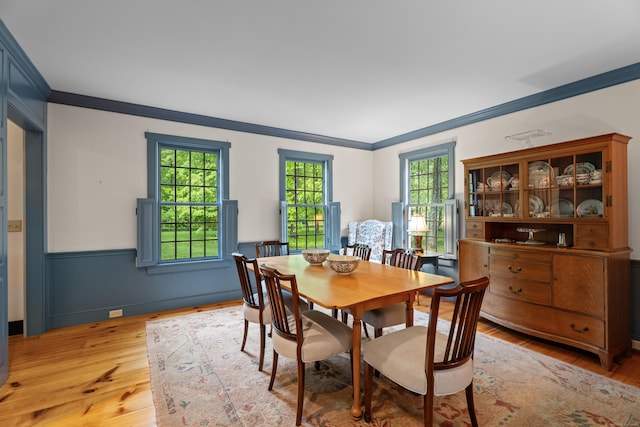 7 Shelter Rock Rd, East Haddam, CT 06423 - dining room with crown molding, light wood-style floors, healthy amount of natural light, and wainscoting