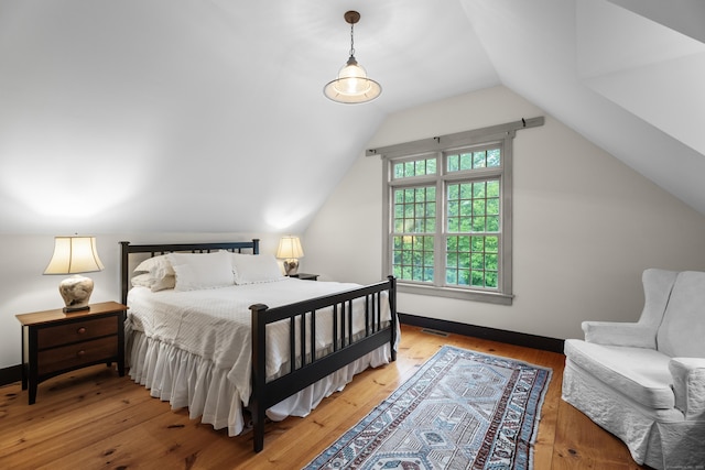7 Shelter Rock Rd, East Haddam, CT 06423 - bedroom with vaulted ceiling, wood-type flooring, and baseboards