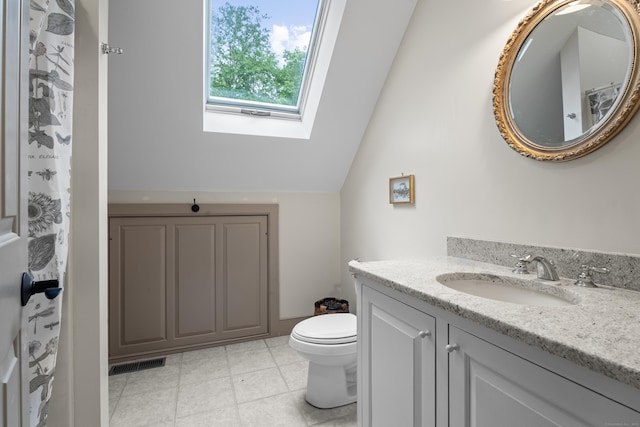 7 Shelter Rock Rd, East Haddam, CT 06423 - bathroom featuring a skylight, vanity, toilet, and vaulted ceiling