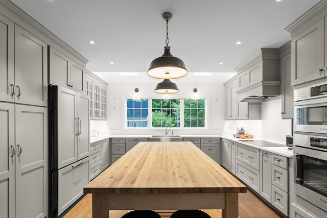 7 Shelter Rock Rd, East Haddam, CT 06423 - kitchen with gray cabinets, high end fridge, a sink, wood counters, and recessed lighting