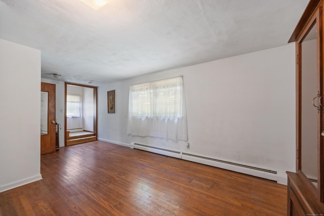 205 Allentown Rd, Plymouth, CT 06786 - empty room with a baseboard heating unit, wood finished floors, and baseboards