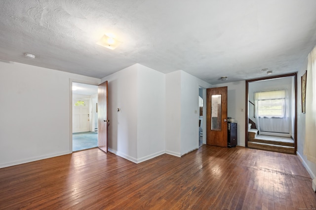 205 Allentown Rd, Plymouth, CT 06786 - unfurnished room featuring wood finished floors, baseboards, and stairway