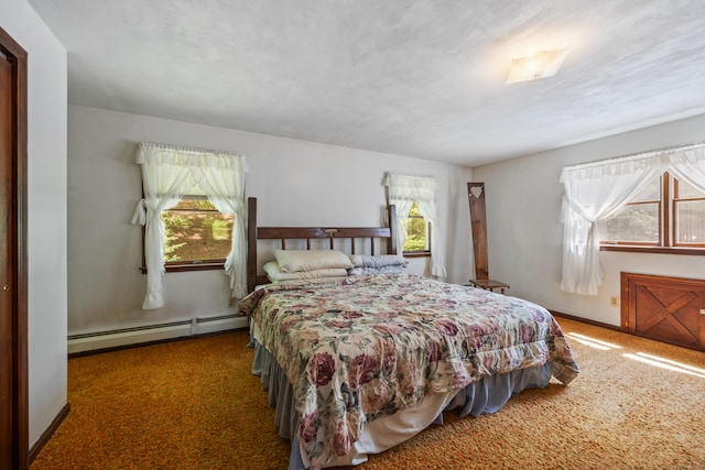 205 Allentown Rd, Plymouth, CT 06786 - bedroom featuring a baseboard heating unit, carpet, and baseboards