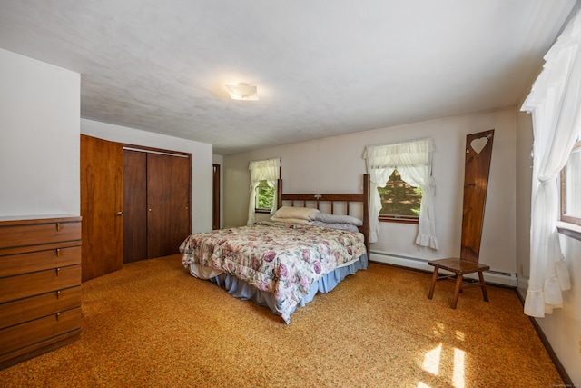 205 Allentown Rd, Plymouth, CT 06786 - carpeted bedroom featuring multiple windows, a closet, and baseboard heating