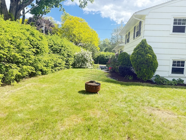 12 Sugar Plum Ln, Fairfield, CT 06824 - view of grassy yard with a fire pit