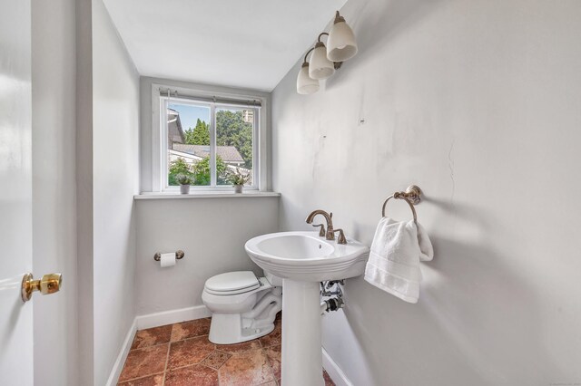 12 Sugar Plum Ln, Fairfield, CT 06824 - half bathroom with toilet and baseboards