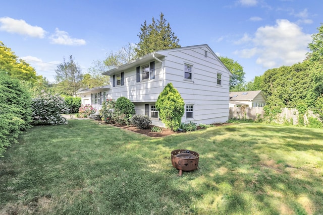 12 Sugar Plum Ln, Fairfield, CT 06824 - rear view of property with an outdoor fire pit