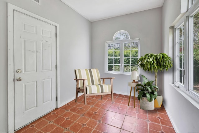 12 Sugar Plum Ln, Fairfield, CT 06824 - living area featuring baseboards and dark tile patterned flooring
