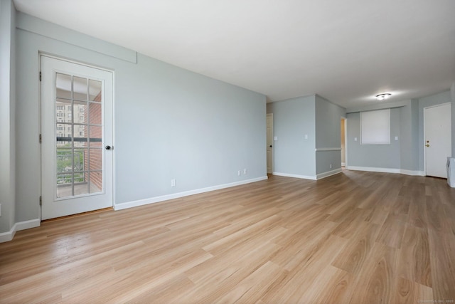 71 Strawberry Hill Ave Unit 710, Stamford, CT 06902 - spare room featuring light wood-style floors and baseboards
