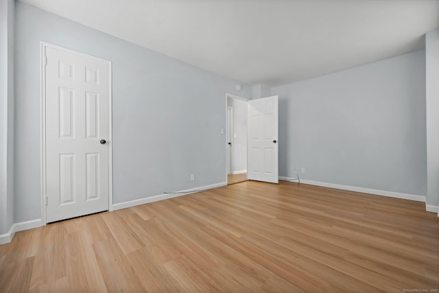 71 Strawberry Hill Ave Unit 710, Stamford, CT 06902 - spare room featuring light wood-style flooring and baseboards