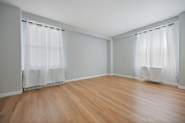 71 Strawberry Hill Ave Unit 710, Stamford, CT 06902 - spare room featuring light wood finished floors and baseboards