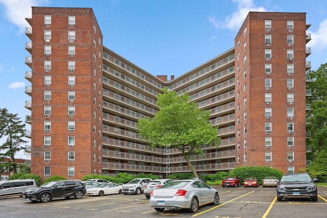 71 Strawberry Hill Ave Unit 710, Stamford, CT 06902 - view of apartment building / complex featuring uncovered parking