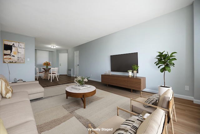 71 Strawberry Hill Ave Unit 710, Stamford, CT 06902 - living room featuring wood finished floors and baseboards