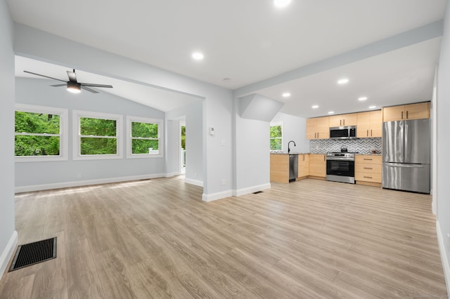 19 Old Acres Rd, East Haddam, CT 06469 - unfurnished living room with baseboards, light wood-style floors, a ceiling fan, recessed lighting, and vaulted ceiling