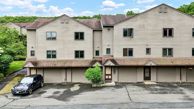 489 Wolcott St Apt 42, Bristol, CT 06010 - view of front of house featuring an attached garage
