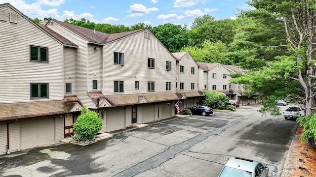 489 Wolcott St Apt 42, Bristol, CT 06010 - view of asphalt road with a residential view