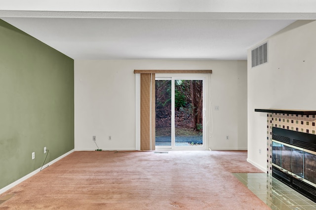 489 Wolcott St Apt 42, Bristol, CT 06010 - unfurnished living room with carpet flooring, a fireplace with flush hearth, and baseboards
