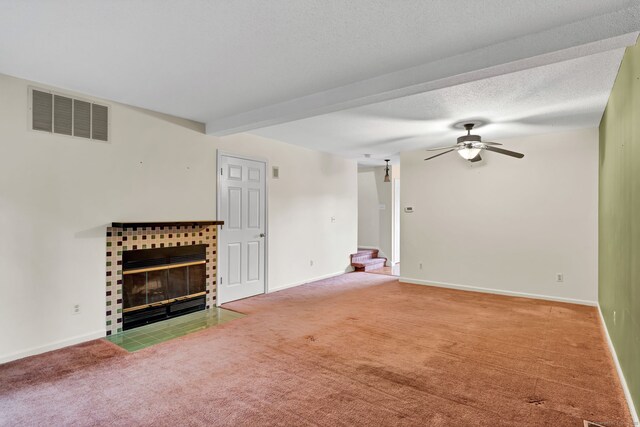 489 Wolcott St Apt 42, Bristol, CT 06010 - unfurnished living room featuring a ceiling fan, carpet, stairs, a brick fireplace, and baseboards